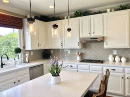 Through the 1980s and 1990s, oak cabinets were it's antimicrobial resin binders make quartz counters impermeable, so stain and. Cheri S New Kitchen White Painted Cabinets Quartz Countertops And Arabesque Backsplash Luxury Kitchens Paint Cabinets White Kitchen Remodel