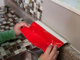 Watch how easy it is to install your own peel and stick tile backsplash in a kitchen with sticktiles. How To Install A Backsplash How Tos Diy