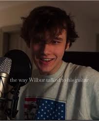 Wilbur Soot Tuning His Guitar