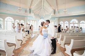Guests Wear All White To A Vow Renewal Wedding Ceremony At Disney S Wedding Pavilion Disney World Wedding Disney Wedding Insta Wedding