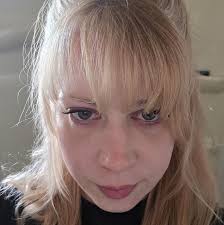 What are good annual plants with lots of blossoms for a front yard in  Boston?