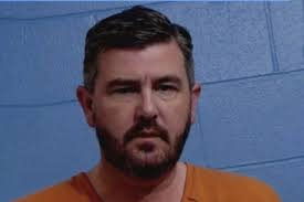 Who is Erik Charles Maund and where he is now?