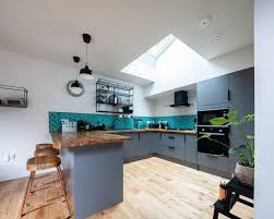 Designed to meet your exact requirements. Barefoot Architects Tucks Weathering Steel House Behind Old Brick Wall