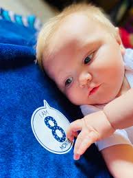 How to make 8-12 months old babies smile for photography?