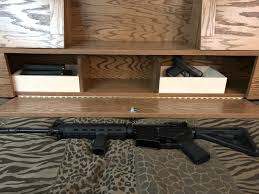 This secret gun cabinet is sure to impress friends and family. Hidden Covert Gun Headboard