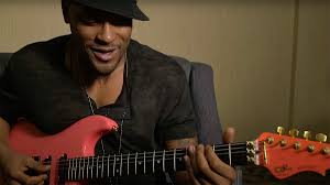 Elusive neo-soul artist D'Angelo flexes his guitar skills