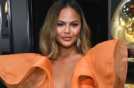 Chrissy teigen fooled everyone with a fake lower back tattoo. Chrissy Teigen Honors Son Jack With Tattoo Billboard
