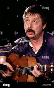 Gives his guitar hi-res stock photography and images