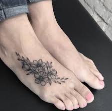 A bird design on each foot, each in a similar style to match but still slightly different. 125 Most Popular Foot Tattoos For Women Wild Tattoo Art