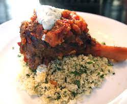 Pile tagine in center of couscous and garnish with herbs. Jamie Oliver Lamb Tagine Pressure Cooker Off 71