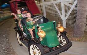 Having Fun Riding The Antique Cars At Family Kingdom Amusement Park Myrtle Beach S Only Seaside Amusement Park Antique Cars Toy Car Amusement Park