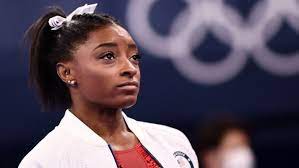 Simone biles withdraws this is how the world is reacting to star's exit from team final competition at the olympics simone biles encourages teammate jordan chiles during the team final of the women's artistic gymnastics competition in tokyo. R7kziddegxdunm