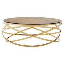 The coffee table is made of mdf and tempered safety glass which is safer and stronger than normal glass. Allure Round Gold Metal Base And Tempered Glass Coffee Table Oak Furniture House
