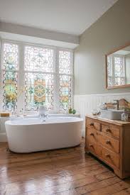They are found above tubs and within the showers. A Striking Restored Victorian Stained Glass Window In A Bathroom Renovation Just Shows You Have Can Make A Feature From Beautiful Bathrooms House Interior Home