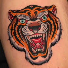 Traditional tiger and pocket watch tattoo on shoulder. 60 American Traditional Tiger Tattoo Ideas