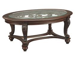It comes from indonesia and is made from beans partially digested from the asian palm. Signature Design By Ashley Norcastle Oval Cocktail Table Brown Walmart Com Walmart Com