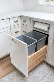 Anyone who has an older kitchen kn. Kitchen Garbage Pull Out With Built In Paper Towel Holder A Must Have For My Kitchen Cabinets Storage Organizers Diy Kitchen Storage Kitchen Cabinet Storage