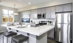 Grey kitchen walls with white cabinets and dark flooring options. Kitchen Colors With Gray Cabinets Designing Idea