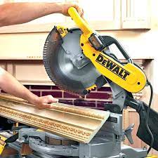Once the adjustments have been made, ensure that you power on the miter saw and carefully cut the baseboard without exerting high pressure on the miter saw and the blade. How To Cut Baseboard With A Miter Saw A Complete Guide Power Saw Expert