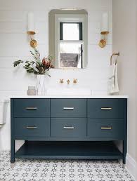 Blue mini brick backlash tiles above a gray bath vanity with gray shaker cabinets and polished nickel pulls topped with black granite. Granite Mountain Stone Design On Twitter Shiplap Blue White And Gold Oh My Some Fresh Bathroom Inspiration For You And Shiplap Is An Easy Diy Weekend Project Whitequartz Stonetop Countertop Bathroom Ensuite