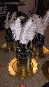 Our online store has everything you need to party and for that special event with delivery australia wide*. Great Gatsby Inspired Centerpiece Wine Bottles With Ombre Color Atop A Matching Plate Gr 1920s Party Decorations Gatsby Party Decorations Gatsby Themed Party
