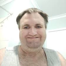 Why is a helicopter circling Cooroy ?