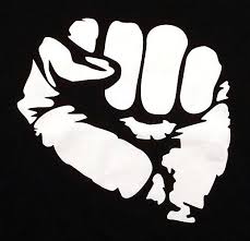 Demonstrators put their fists in the air as a sign of 'black power' during a protest against police brutality and the death of freddie gray outside. Black Power Fist