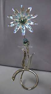 20% cheaper than the uk high street. Swarovski Crystal Paradise Flowers Dellaria Aquamarine 945872 The Crystal Lodge Specialists In Retired Swarovski Crystal Uk S No 1