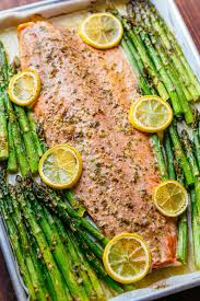 One Pan Salmon And Asparagus With Garlic Herb Butter Is Quick And Easy 25 Minute Meal The Garlic He Salmon And Asparagus Salmon Recipes Garlic Butter Salmon