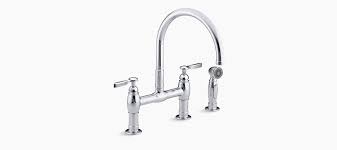 The kitchen faucet is leaking from under the handle. K 6131 4 Parq Deck Mount Bridge Kitchen Sink Faucet With Sidespray Kohler