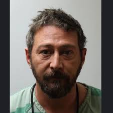 Man accused of holding gun to Domino's delivery driver's head in Carter  County