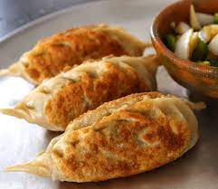 In korea, mandu was traditionally made for celebratory occasions such as weddings and the new year. King Size Kimchi Dumplings Kimchi Wangmandu Recipe By Maangchi