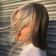 You can tell that there are red and blonde streaks in the 'do, but they still melt together to produce a very harmonious finish. Mimi Wade S Silver Hair Streak Is Lighting Up London Fashion Week Vogue