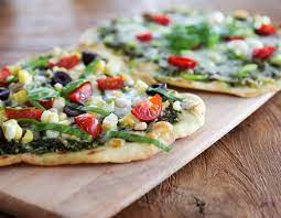 The dough is ready to bake in little more than an hour start to finish. Flatbread Pizza Hilah Cooking