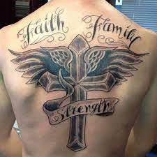 Beautiful cross made in flower pattern back tattoo. Pin On Cool Tattoos For Men
