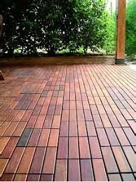 It does not mean that water won't get around or past a waterproof plank. 8 Waterproof Floors Ideas Porch Flooring Waterproof Flooring Patio Flooring