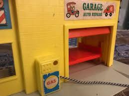 Fisher price little people wheelies garage play set. Vintage Fisher Price Little People Downtown Garage Set A Game Guess How Much Lead