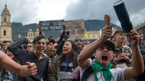 Colombians take to the streets to oppose tax reform. Colombia Protests Pile Pressure On President And Hamper Reforms Financial Times
