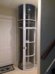 Glass Home And Tube Elevator Cost Houston Texas Home Elevator Of Houston In 2020 House Elevation Tiny House Stairs Elevation