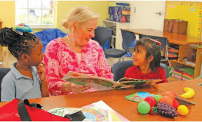 One woman, one child, one red wagon, inspire Christ Child Society of Naples 