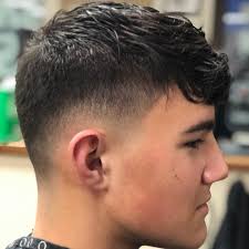 Low skin fade with a long top 👌#classic #barber #menshaircut #baldfade 💈