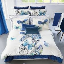 Dreamy turquoise blue bedroom with charming turquoise blue gray and white floral wallpaper and bedding by nina campbell. Luxury Blue Turquoise Teal Bedding From Designers Guild