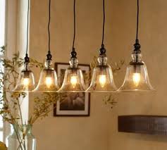 Farmhouse's rustic, reclaimed feel combines vintage or distressed items with delicate accents like potted flowers and airy open shelving for a timeless look. Home Garden Pottery Barn Rustic Glass Bell Jar Pendant Light Fixture Chandelier Bronze Small Lamps Lighting Ceiling Fans