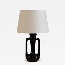 This domain is for use in illustrative examples in documents. Chic Small Black Ceramic Table Lamp