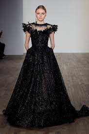 Not only are black wedding dresses sleek and stylish, they're also very versatile and can easily be worn again and again long after you say i do. how can i accessorize my black wedding dress? Wedding Dress Trends From Fall 2019 Bridal Fashion Week Black Wedding Dresses Lazaro Wedding Dress Wedding Dress Trends