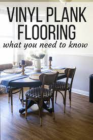 Dining Room With Mohawk Vinyl Plank Flooring And Text Overlay Vinyl Plank Flooring What You Need To Know Vinyl Plank Flooring Plank Flooring Vinyl Plank