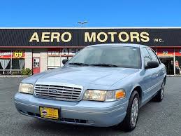 Image result for Light Ice Blue 2003 Crown Victoria
