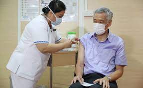 As more people are vaccinated, the collective protection will become more effective. Please Take It Singapore Pm Says After Getting Covid 19 Vaccine