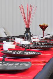Foods like lemons and oranges are classic summer items, so use them successfully in this décor by finding plates and napkins with images of the fruits on them. Dinner Table Setting For Sushi Stock Photos Freeimages Com