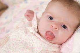 He comes by it honestly because apparently i used to do it when i was a baby according to my mother. A Baby Sticking Out Her Tongue Alberta Canada Stock Photo Dissolve
